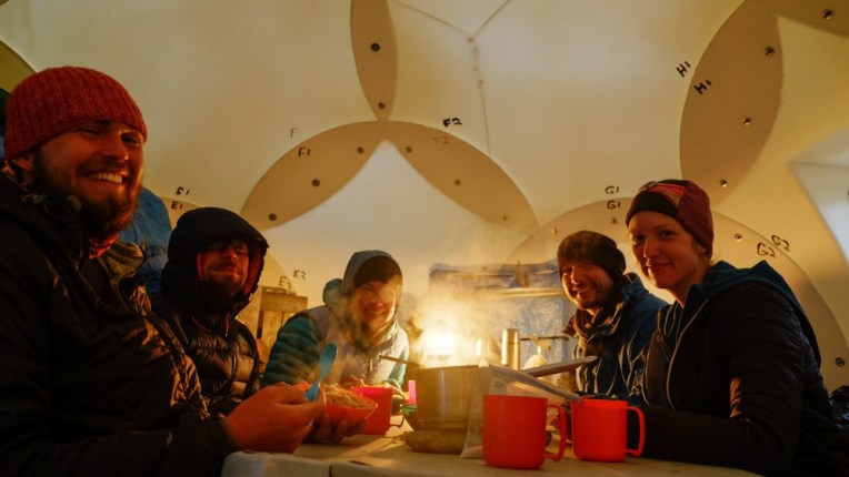 Polar scientists enjoying a tundra feast.
